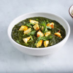 A view of a bowl of saag paneer.